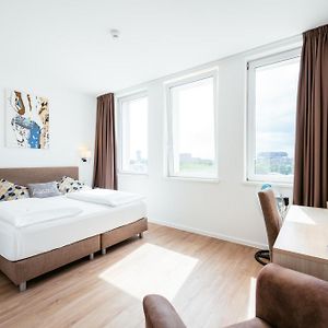 Kamer met een Queen Size Bed